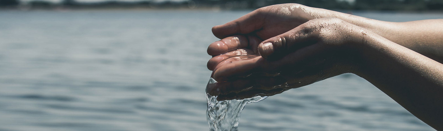 hands scooping water